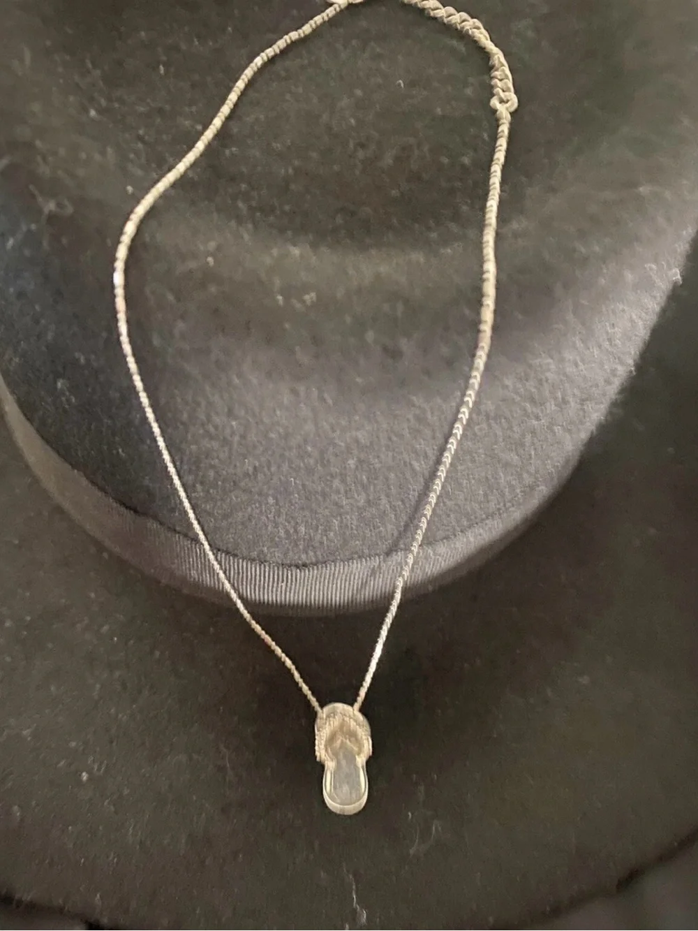 Coach pendant flip